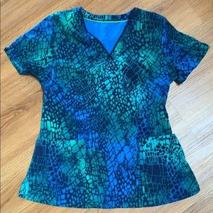 Dry fit helping hands scrub top med. runs small.